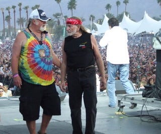 Poodie on stage with Willie Nelson